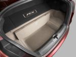 Подиум между колесными арками в багажнике скрывает баллон для водорода, который занимает не так уж много места... | Nissan Murano • Honda FCX Clarity