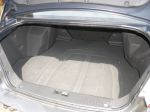 Основной недостаток багажника Epica — сильно выступающие внутрь колесные арки, не только сужающие полезное пространство, но и отнимающие часть объема | Chevrolet Epica LT