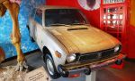 Один из экспонатов Музея удивительных предметов — Honda Civic, обклеенная несколькими тысячами 25-центовых монет | Флорида